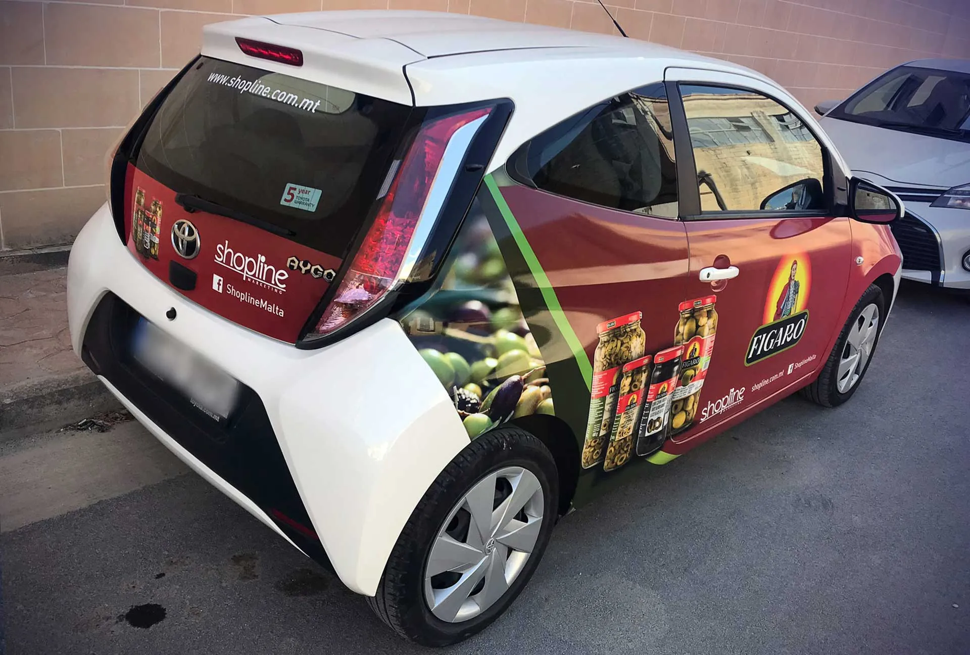 Figaro Car — vehicle wrapping by Delta Media Services