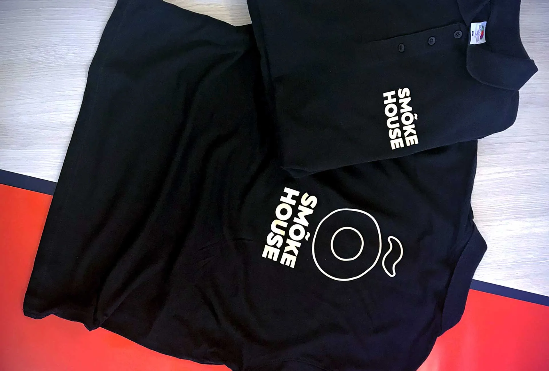 Smoke House Poloshirt — uniforms & kits by Delta Media Services